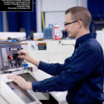 M4 Sciences CEO and founder James Mann works on a computer numerically controlled lathe machine.